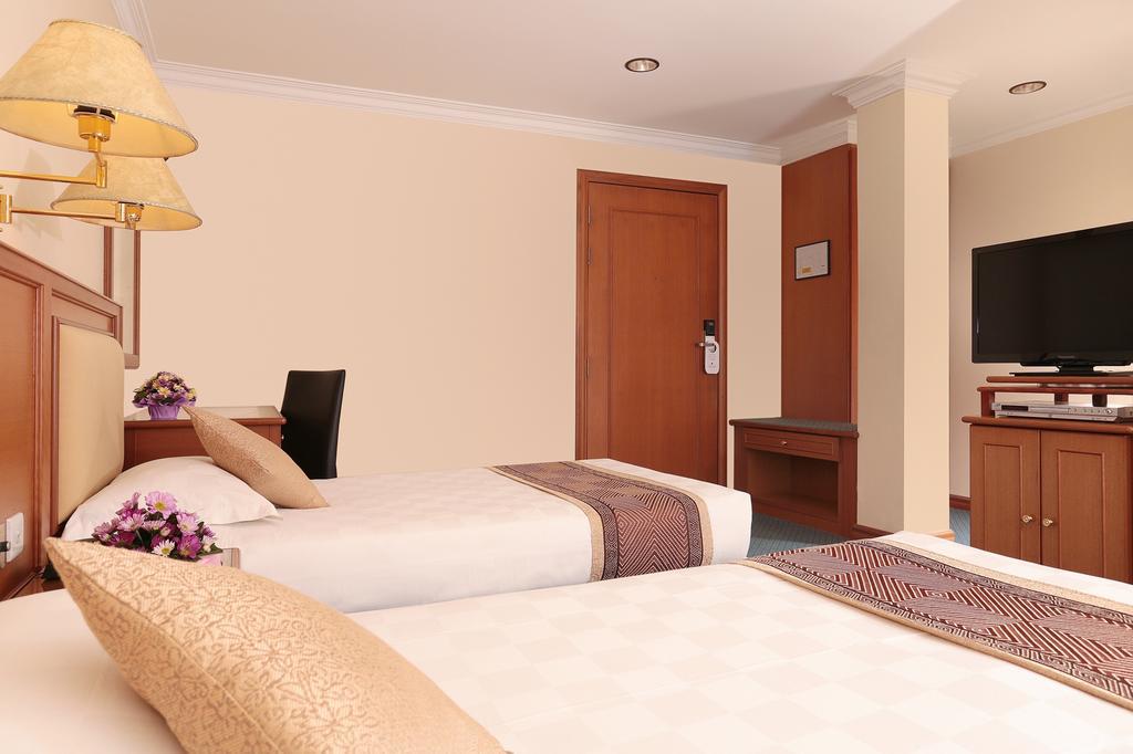 Hotel Sentosa Kuala Belait Номер фото